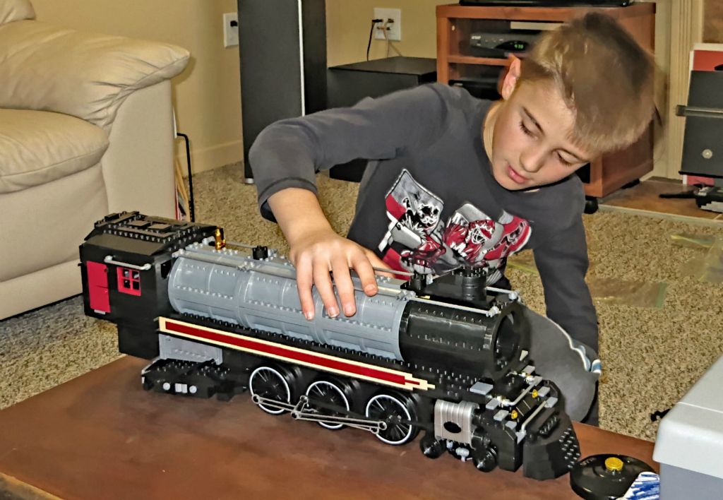 Ben building a complex train engine